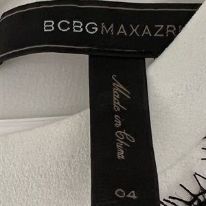 BCBG cream/black lace short cocktail dress like new worn once. Classic beauty